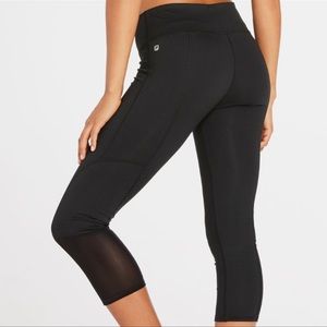 Fabletics Buffy Capri Black Mesh Calf Accent Leggings